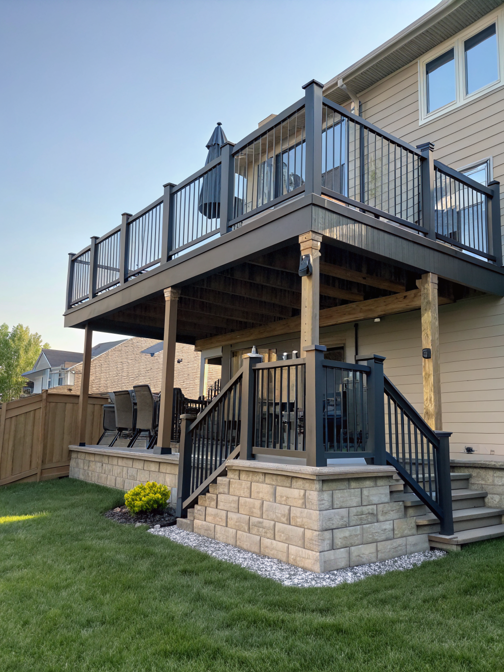 Multi-level custom composite deck with cable railings built in Decatur